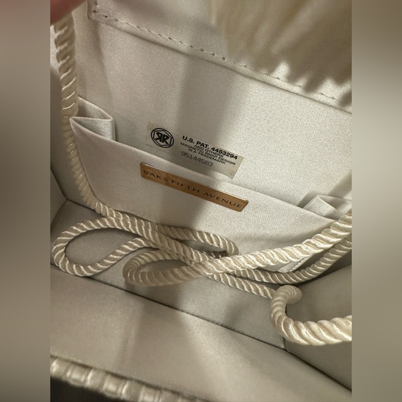 Brand new Saks Fifth Avenue satin white cross weave purse with tassel and tags - Picture 6 of 6